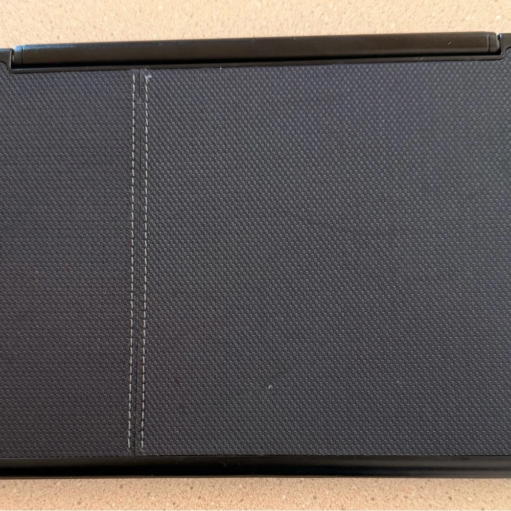 iPad Mini 4, 64 GB. Great portable unit. Free hard case and wireless keyboard